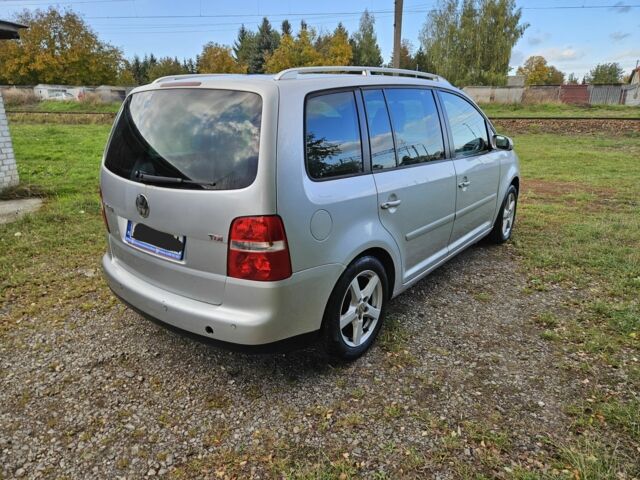 Серый Фольксваген Туран, объемом двигателя 2 л и пробегом 380 тыс. км за 2350 $, фото 2 на Automoto.ua