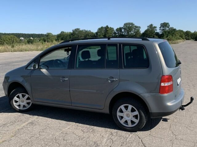 Серый Фольксваген Туран, объемом двигателя 1.6 л и пробегом 234 тыс. км за 6100 $, фото 6 на Automoto.ua