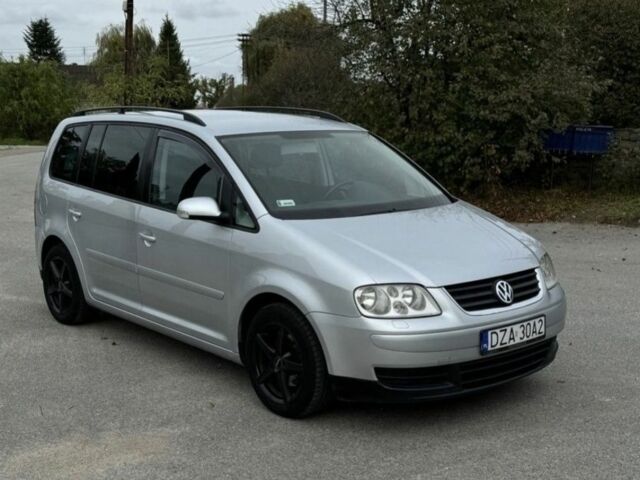 Серый Фольксваген Туран, объемом двигателя 1.9 л и пробегом 277 тыс. км за 1546 $, фото 3 на Automoto.ua