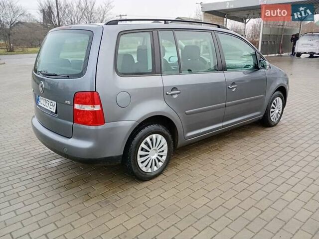 Серый Фольксваген Туран, объемом двигателя 1.6 л и пробегом 238 тыс. км за 4299 $, фото 5 на Automoto.ua