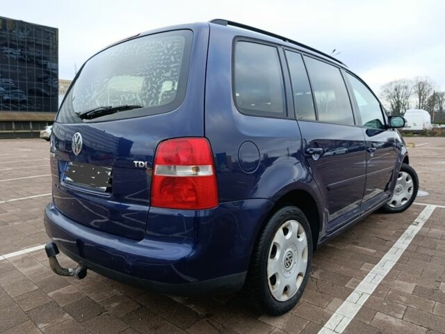 Сірий Фольксваген Туран, об'ємом двигуна 2 л та пробігом 300 тис. км за 2349 $, фото 2 на Automoto.ua