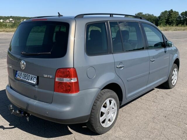 Серый Фольксваген Туран, объемом двигателя 1.6 л и пробегом 234 тыс. км за 6100 $, фото 2 на Automoto.ua