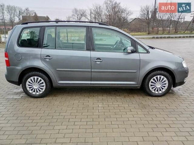 Серый Фольксваген Туран, объемом двигателя 1.6 л и пробегом 238 тыс. км за 4299 $, фото 6 на Automoto.ua