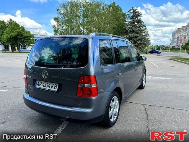 Сірий Фольксваген Туран, об'ємом двигуна 1.6 л та пробігом 239 тис. км за 5400 $, фото 3 на Automoto.ua