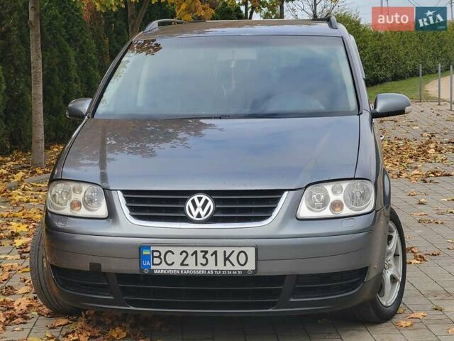 Серый Фольксваген Туран, объемом двигателя 2 л и пробегом 330 тыс. км за 5300 $, фото 4 на Automoto.ua