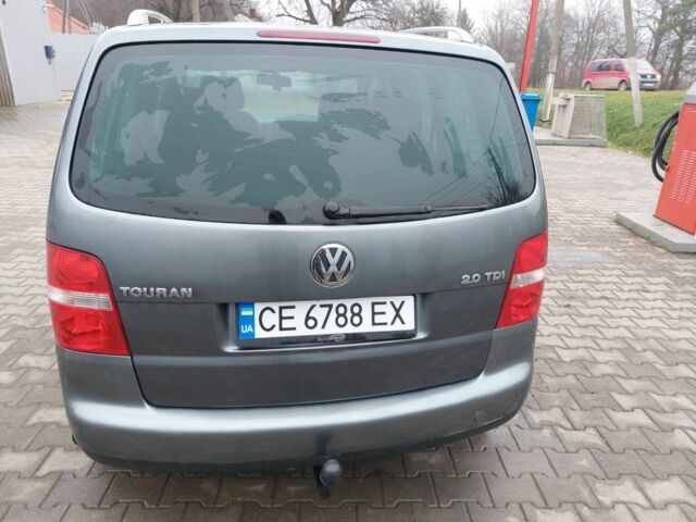 Серый Фольксваген Туран, объемом двигателя 2 л и пробегом 320 тыс. км за 6200 $, фото 2 на Automoto.ua