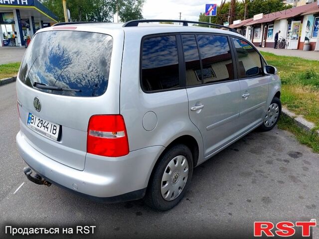 Сірий Фольксваген Туран, об'ємом двигуна 1.6 л та пробігом 219 тис. км за 6699 $, фото 4 на Automoto.ua