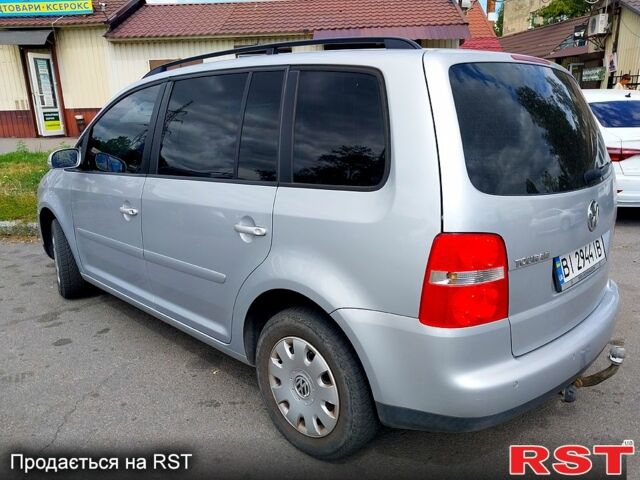 Сірий Фольксваген Туран, об'ємом двигуна 1.6 л та пробігом 219 тис. км за 6699 $, фото 3 на Automoto.ua