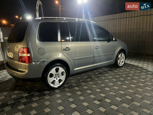 Сірий Фольксваген Туран, об'ємом двигуна 1.97 л та пробігом 334 тис. км за 6300 $, фото 1 на Automoto.ua