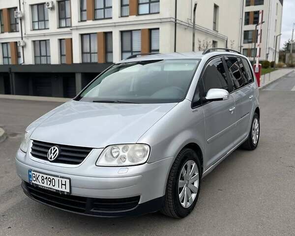 Серый Фольксваген Туран, объемом двигателя 2 л и пробегом 296 тыс. км за 4999 $, фото 12 на Automoto.ua