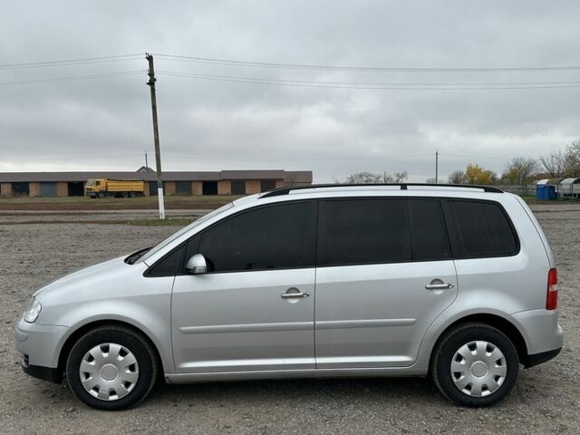 Серый Фольксваген Туран, объемом двигателя 1.6 л и пробегом 324 тыс. км за 6500 $, фото 6 на Automoto.ua