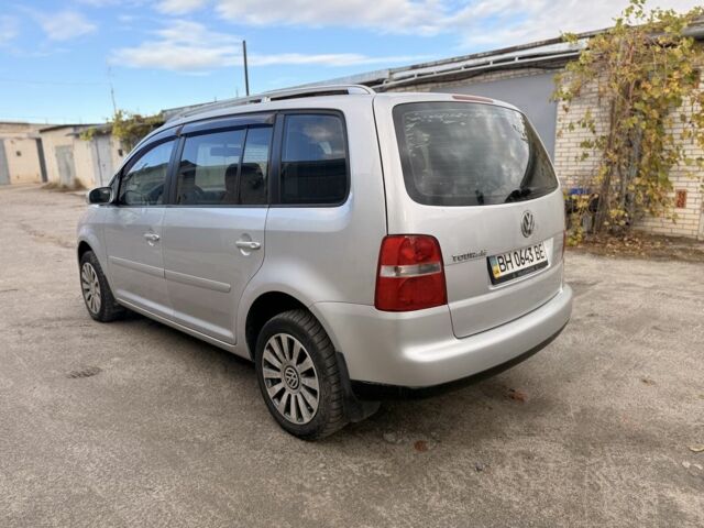 Серый Фольксваген Туран, объемом двигателя 1.6 л и пробегом 261 тыс. км за 5000 $, фото 5 на Automoto.ua