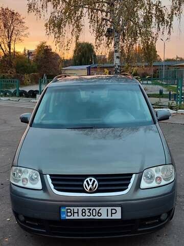 Серый Фольксваген Туран, объемом двигателя 1.9 л и пробегом 254 тыс. км за 5950 $, фото 4 на Automoto.ua