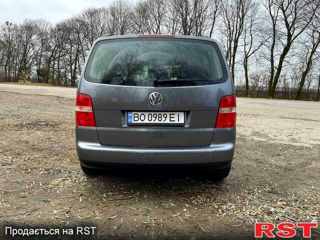 Серый Фольксваген Туран, объемом двигателя 1.6 л и пробегом 241 тыс. км за 4999 $, фото 3 на Automoto.ua