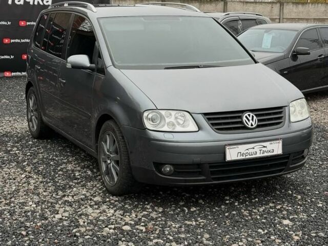 Серый Фольксваген Туран, объемом двигателя 2 л и пробегом 300 тыс. км за 7500 $, фото 2 на Automoto.ua