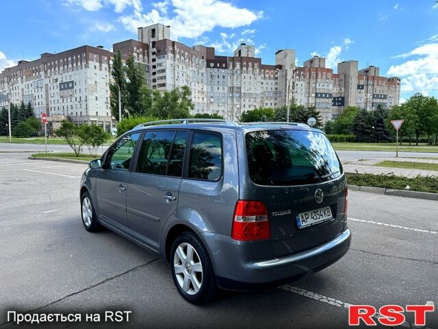 Сірий Фольксваген Туран, об'ємом двигуна 1.6 л та пробігом 239 тис. км за 5400 $, фото 7 на Automoto.ua