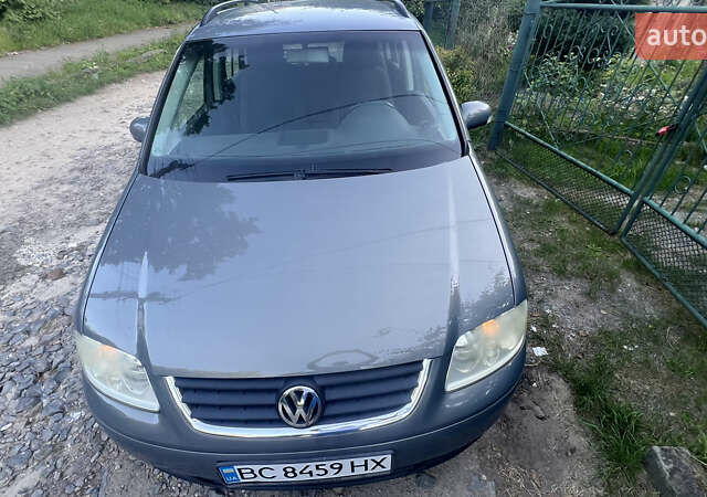 Серый Фольксваген Туран, объемом двигателя 1.9 л и пробегом 295 тыс. км за 5700 $, фото 2 на Automoto.ua