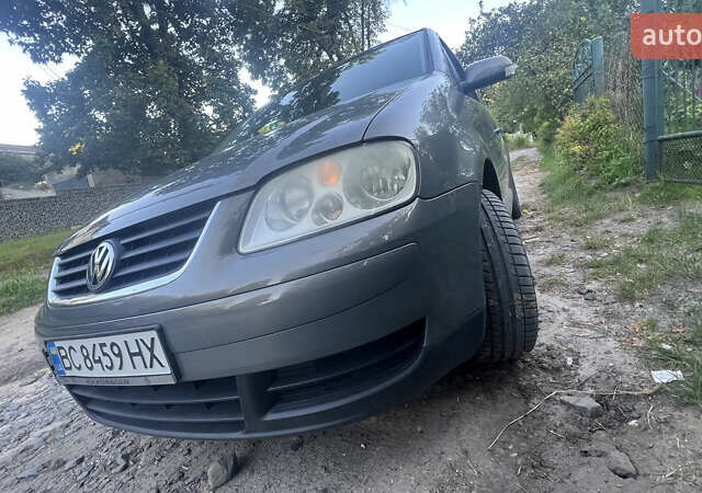 Серый Фольксваген Туран, объемом двигателя 1.9 л и пробегом 295 тыс. км за 5700 $, фото 3 на Automoto.ua