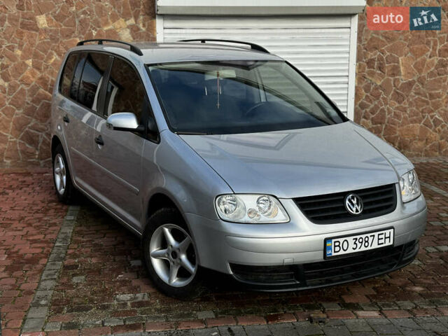 Серый Фольксваген Туран, объемом двигателя 1.9 л и пробегом 205 тыс. км за 5600 $, фото 2 на Automoto.ua