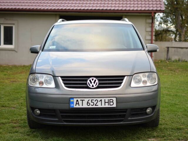 Серый Фольксваген Туран, объемом двигателя 2 л и пробегом 370 тыс. км за 4950 $, фото 7 на Automoto.ua