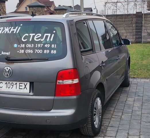 Сірий Фольксваген Туран, об'ємом двигуна 2 л та пробігом 310 тис. км за 5800 $, фото 9 на Automoto.ua