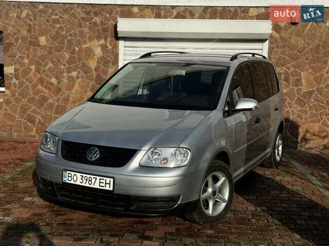 Серый Фольксваген Туран, объемом двигателя 1.9 л и пробегом 205 тыс. км за 5600 $, фото 1 на Automoto.ua