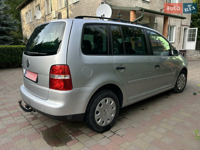 Серый Фольксваген Туран, объемом двигателя 1.6 л и пробегом 230 тыс. км за 5790 $, фото 2 на Automoto.ua