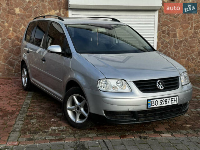 Серый Фольксваген Туран, объемом двигателя 1.9 л и пробегом 205 тыс. км за 5600 $, фото 3 на Automoto.ua