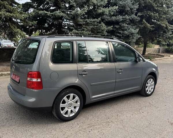 Серый Фольксваген Туран, объемом двигателя 1.6 л и пробегом 181 тыс. км за 5900 $, фото 2 на Automoto.ua