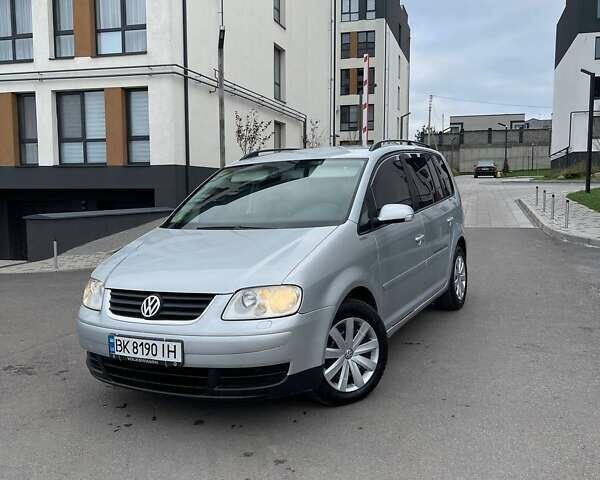 Серый Фольксваген Туран, объемом двигателя 2 л и пробегом 296 тыс. км за 4999 $, фото 8 на Automoto.ua