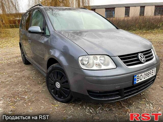 Серый Фольксваген Туран, объемом двигателя 1.6 л и пробегом 241 тыс. км за 4999 $, фото 2 на Automoto.ua