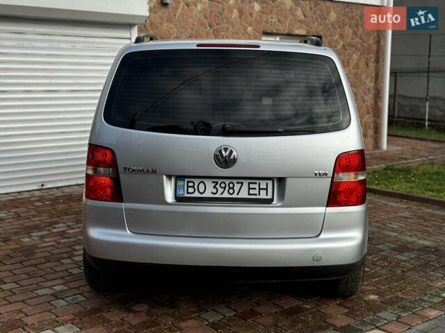Серый Фольксваген Туран, объемом двигателя 1.9 л и пробегом 205 тыс. км за 5600 $, фото 10 на Automoto.ua