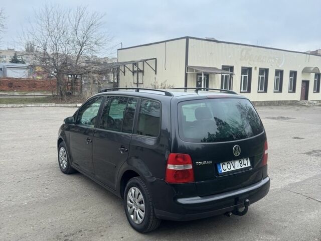 Серый Фольксваген Туран, объемом двигателя 2 л и пробегом 250 тыс. км за 3550 $, фото 7 на Automoto.ua