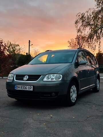 Серый Фольксваген Туран, объемом двигателя 1.9 л и пробегом 254 тыс. км за 5950 $, фото 1 на Automoto.ua