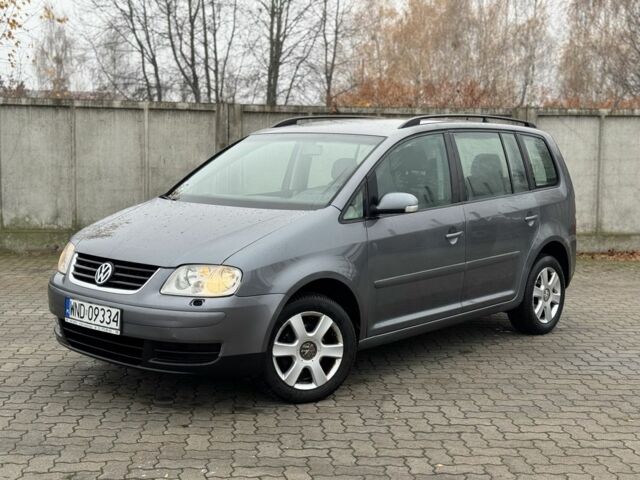 Серый Фольксваген Туран, объемом двигателя 2 л и пробегом 370 тыс. км за 2550 $, фото 3 на Automoto.ua