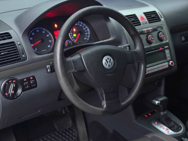 Сірий Фольксваген Туран, об'ємом двигуна 1.4 л та пробігом 211 тис. км за 6799 $, фото 7 на Automoto.ua