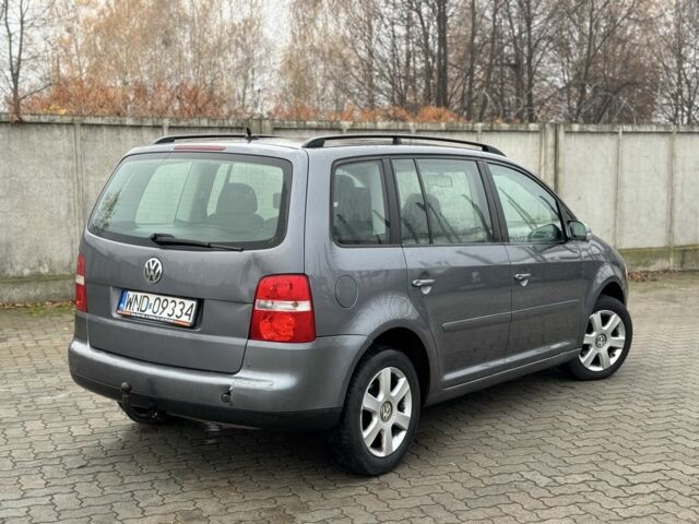 Серый Фольксваген Туран, объемом двигателя 2 л и пробегом 370 тыс. км за 2550 $, фото 4 на Automoto.ua