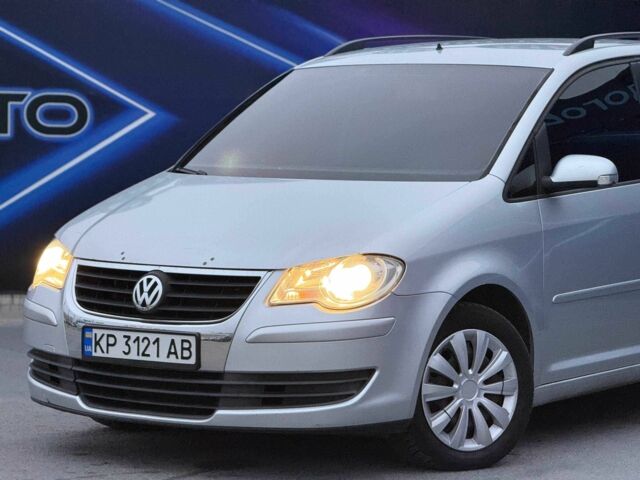 Сірий Фольксваген Туран, об'ємом двигуна 1.4 л та пробігом 211 тис. км за 6799 $, фото 1 на Automoto.ua