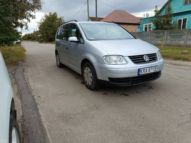 Серый Фольксваген Туран, объемом двигателя 1.9 л и пробегом 430 тыс. км за 2450 $, фото 1 на Automoto.ua