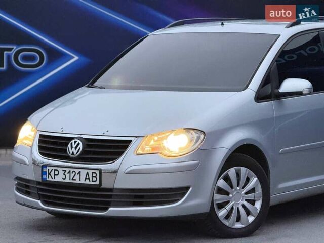 Серый Фольксваген Туран, объемом двигателя 1.39 л и пробегом 211 тыс. км за 6799 $, фото 1 на Automoto.ua
