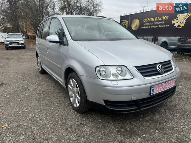 Сірий Фольксваген Туран, об'ємом двигуна 1.6 л та пробігом 221 тис. км за 6499 $, фото 1 на Automoto.ua