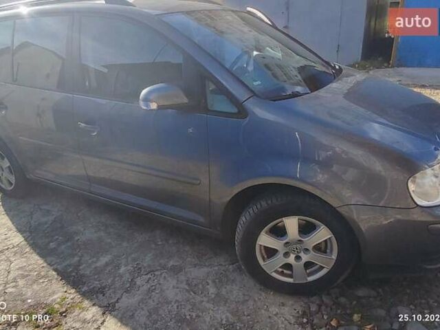 Серый Фольксваген Туран, объемом двигателя 2 л и пробегом 181 тыс. км за 4900 $, фото 4 на Automoto.ua