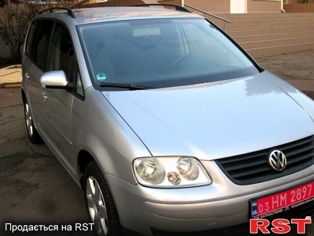 Серый Фольксваген Туран, объемом двигателя 1.6 л и пробегом 230 тыс. км за 6500 $, фото 1 на Automoto.ua