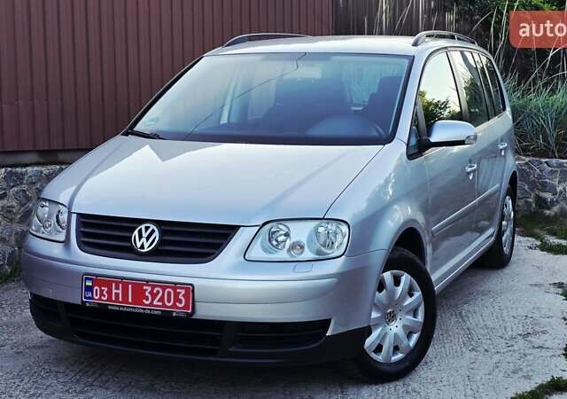 Серый Фольксваген Туран, объемом двигателя 1.6 л и пробегом 270 тыс. км за 6499 $, фото 3 на Automoto.ua