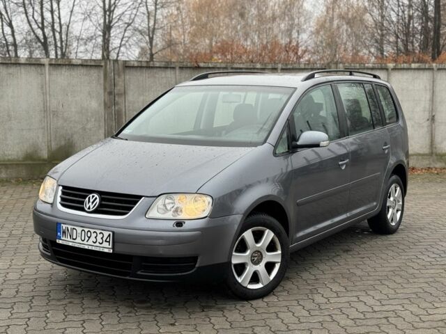 Серый Фольксваген Туран, объемом двигателя 2 л и пробегом 370 тыс. км за 2550 $, фото 2 на Automoto.ua