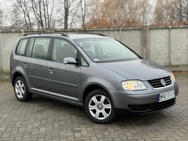 Серый Фольксваген Туран, объемом двигателя 2 л и пробегом 370 тыс. км за 2550 $, фото 1 на Automoto.ua