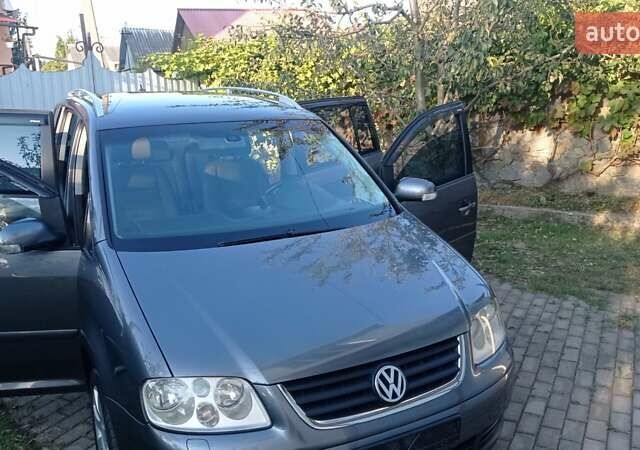 Серый Фольксваген Туран, объемом двигателя 1.9 л и пробегом 281 тыс. км за 6500 $, фото 28 на Automoto.ua