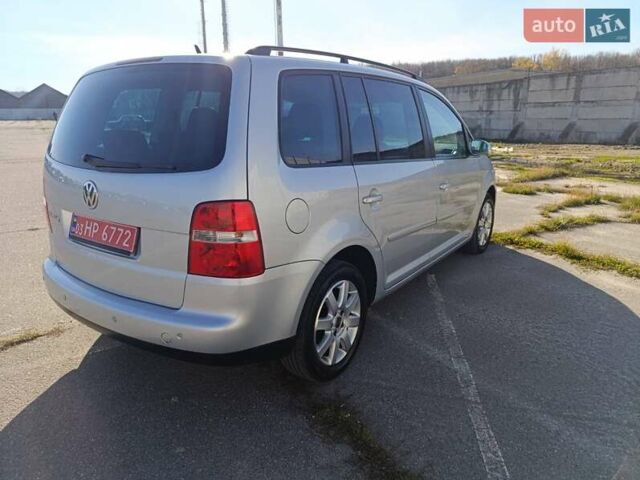 Серый Фольксваген Туран, объемом двигателя 1.6 л и пробегом 243 тыс. км за 5999 $, фото 2 на Automoto.ua