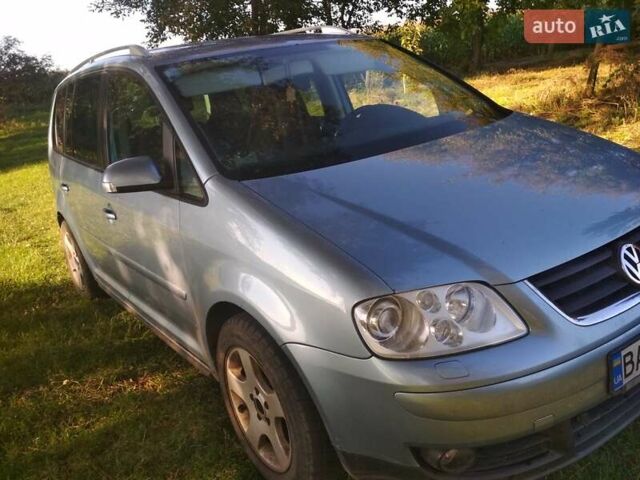 Серый Фольксваген Туран, объемом двигателя 1.39 л и пробегом 200 тыс. км за 5500 $, фото 4 на Automoto.ua