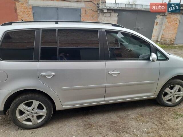 Серый Фольксваген Туран, объемом двигателя 1.39 л и пробегом 212 тыс. км за 5800 $, фото 1 на Automoto.ua